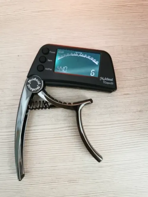 2-in-1 Guitar Capo Tuner with LED Display for All Instruments photo review