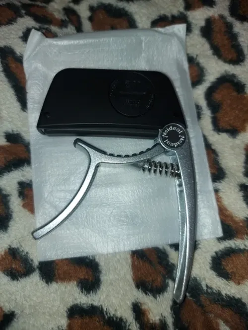 2-in-1 Guitar Capo Tuner with LED Display for All Instruments photo review
