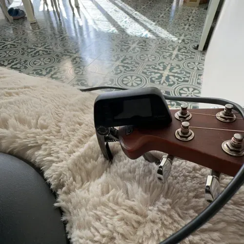 2-in-1 Guitar Capo Tuner with LED Display for All Instruments photo review