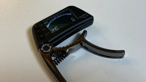 2-in-1 Guitar Capo Tuner with LED Display for All Instruments photo review