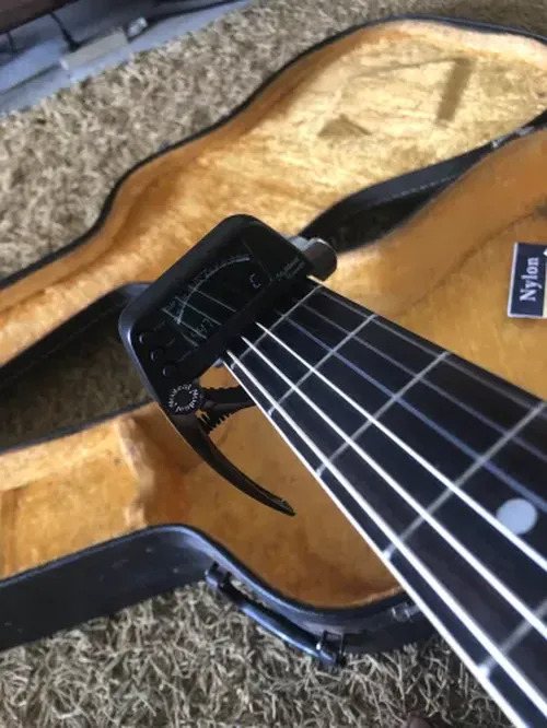 2-in-1 Guitar Capo Tuner with LED Display for All Instruments photo review
