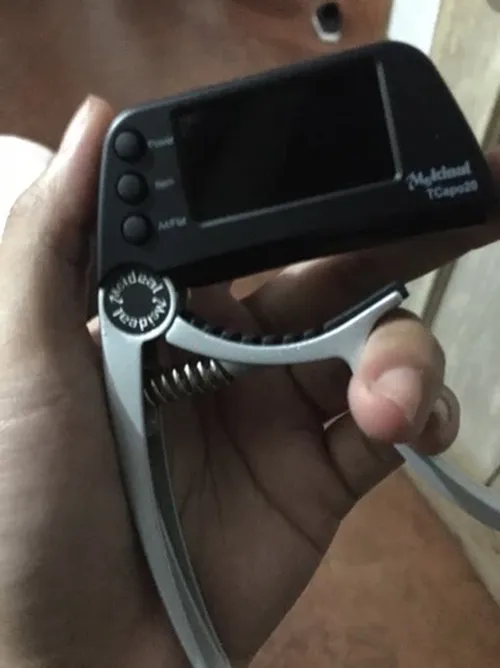 2-in-1 Guitar Capo Tuner with LED Display for All Instruments photo review