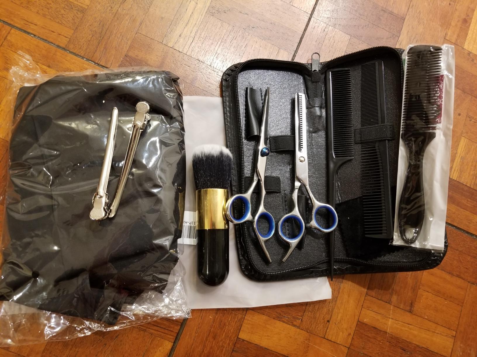 9-Piece Barber Haircut Set with Cape and Storage Case photo review