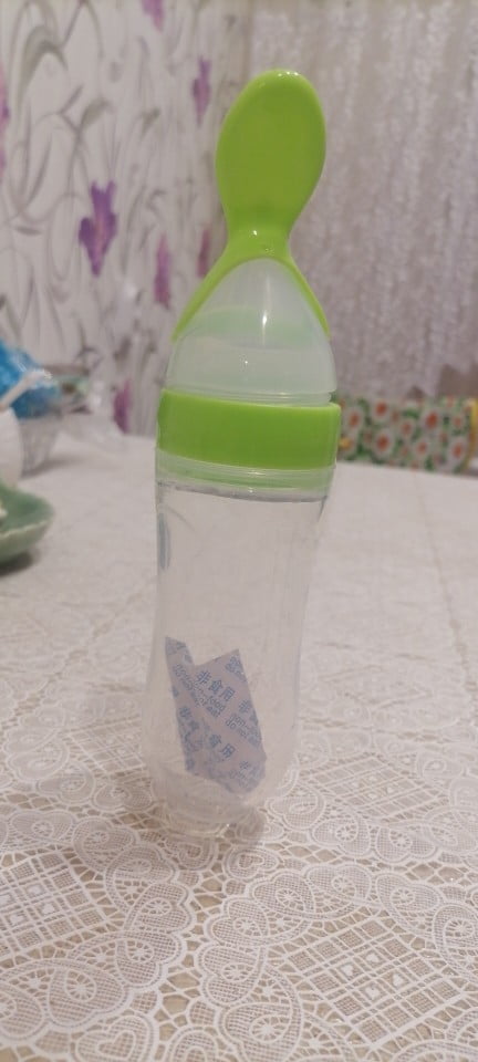 Baby Bottle Feeding Squeezer Baby Spoon Feeder photo review