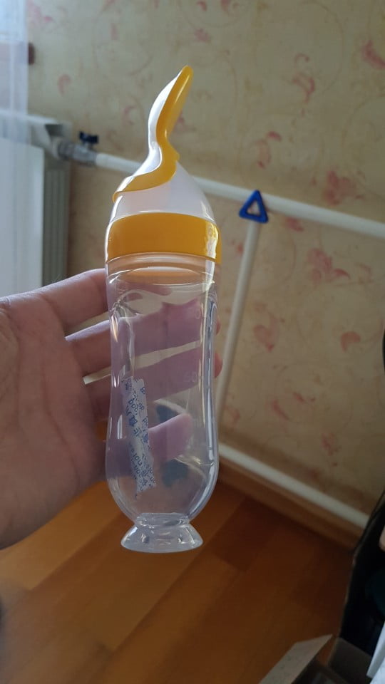 Baby Bottle Feeding Squeezer Baby Spoon Feeder photo review
