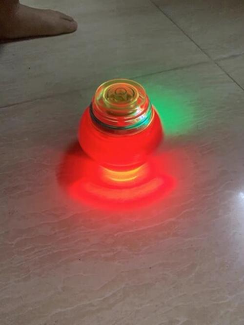 Luminous Rotating Gyro Fidget Spinner with Light and Music for Kids photo review
