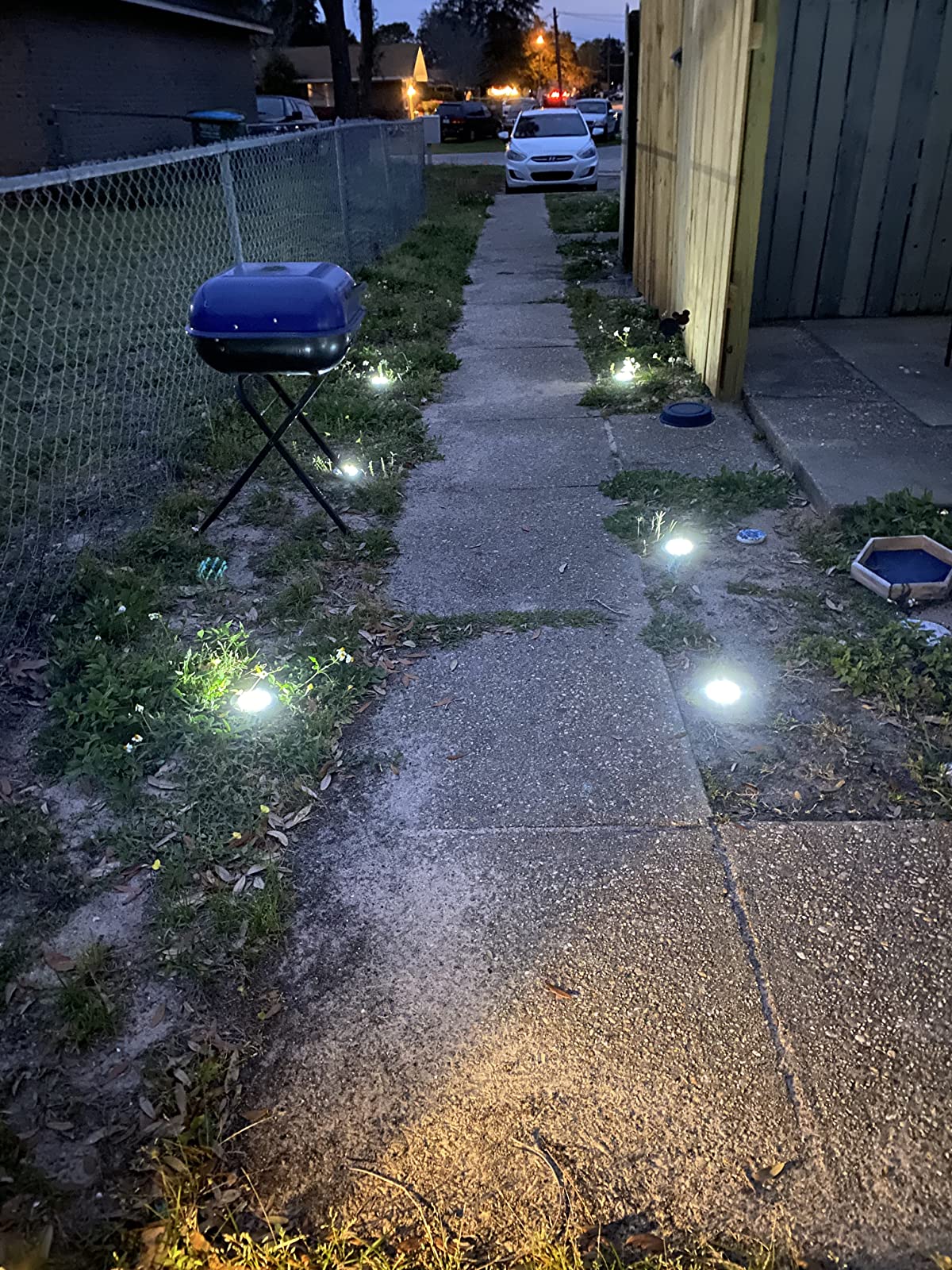 Set Of 4 Waterproof Solar Powered Garden Lights 8 LED photo review