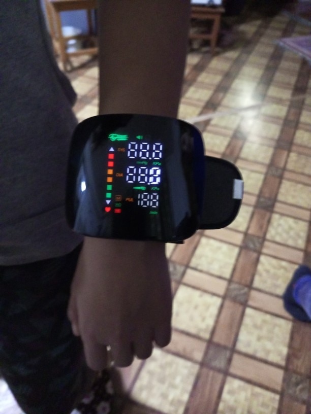 Smart Wrist Blood Pressure Monitor with Voice Detection and Digital Display photo review