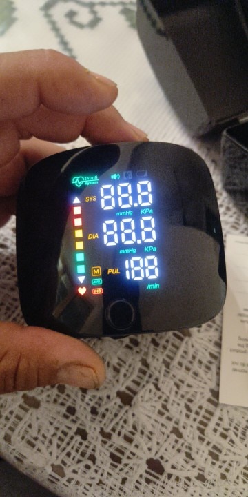 Smart Wrist Blood Pressure Monitor with Voice Detection and Digital Display photo review