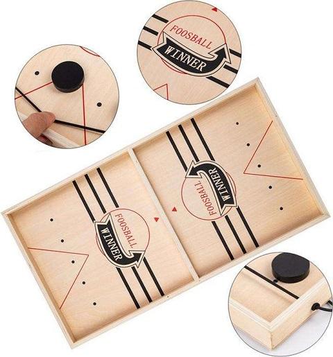 Tanoshi™ The Fast Sling Puck Board Game is a heart-pounding, action-packed game that has you racing your opponent to pass all the pucks through the center gate to the opposite side!