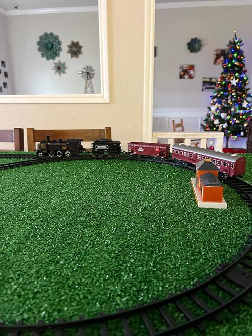 Train Toys with Luxury Tracks and Glowing Passenger, Christmas Train Sets for Around The Tree with Smokes, Lights & Sound photo review