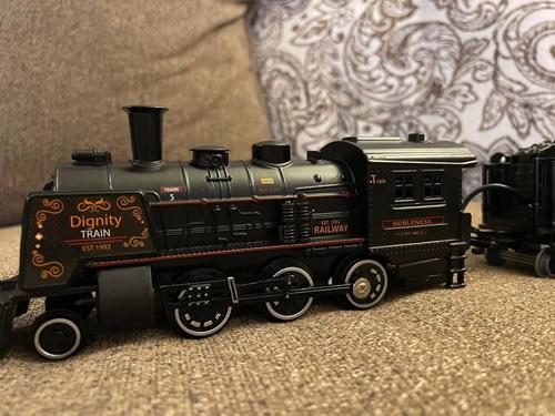 Train Toys with Luxury Tracks and Glowing Passenger, Christmas Train Sets for Around The Tree with Smokes, Lights & Sound photo review