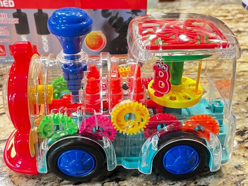 Transparent Electric Gear Train Toy with Flashing Lights and Music, Light Up Train Toys, Fun and Interactive Electric Train Toy photo review